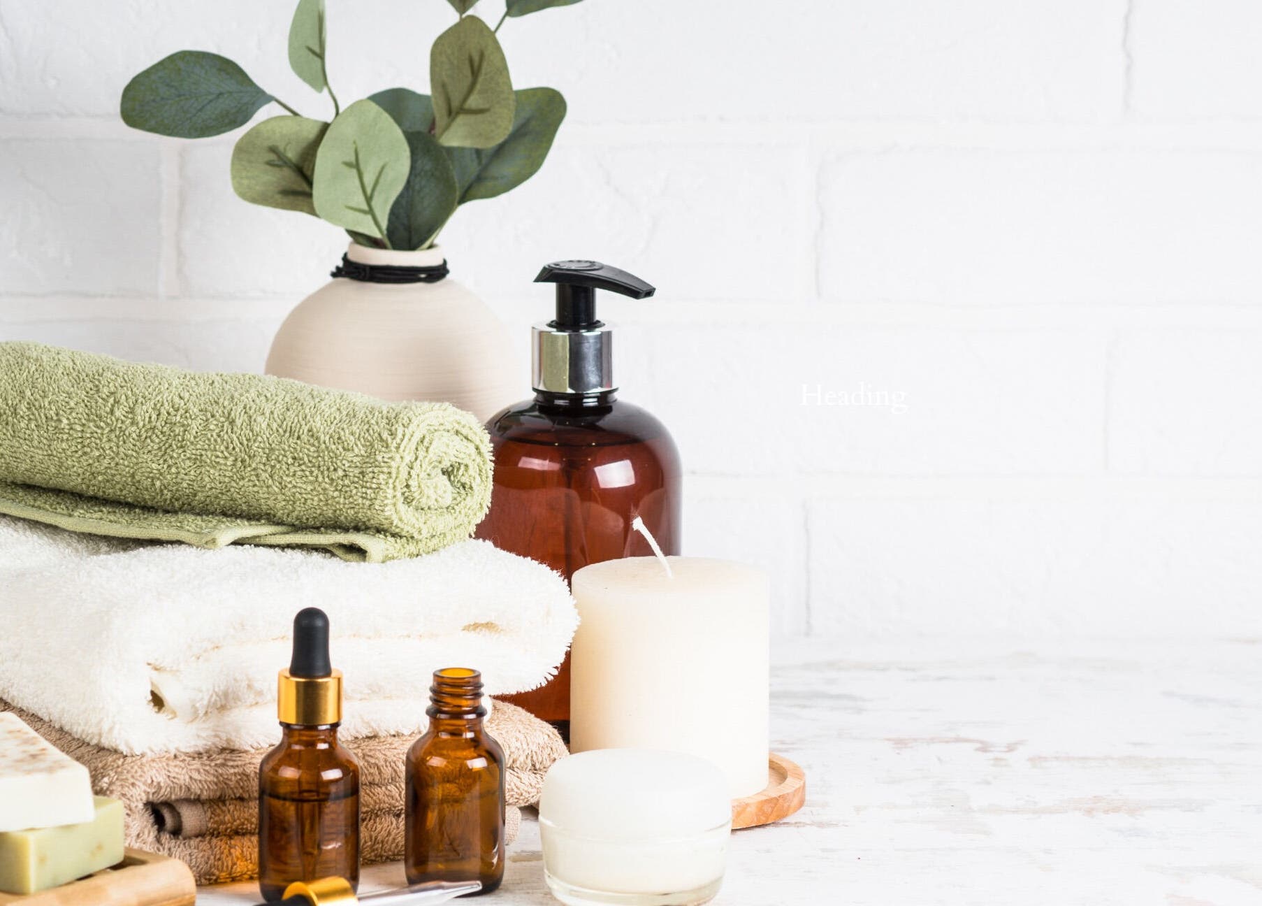 Relaxing spa essentials at Hourglass BodyWorks in Slidell, Louisiana, US, showcasing towels and oils.