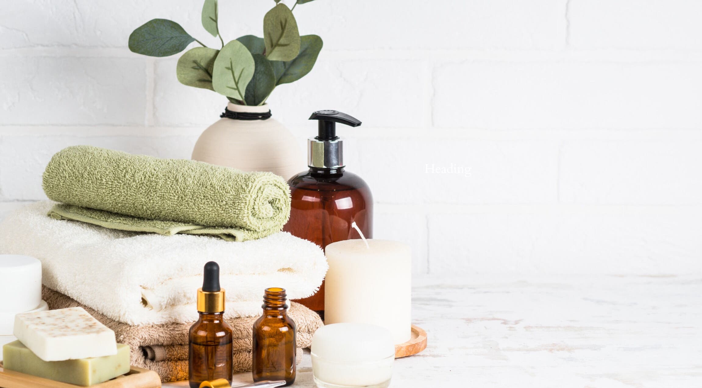 Relaxing spa essentials at Hourglass BodyWorks in Slidell, Louisiana, US, showcasing towels and oils.