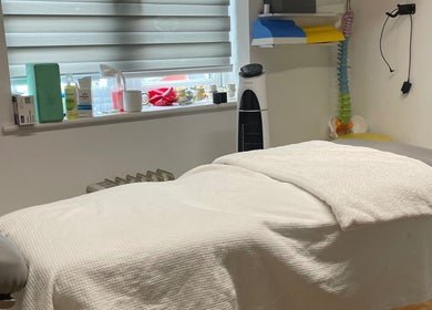 Massage bed in serene room at Vofitnesss - Personal Training & Sports Massage, London, England, GB.