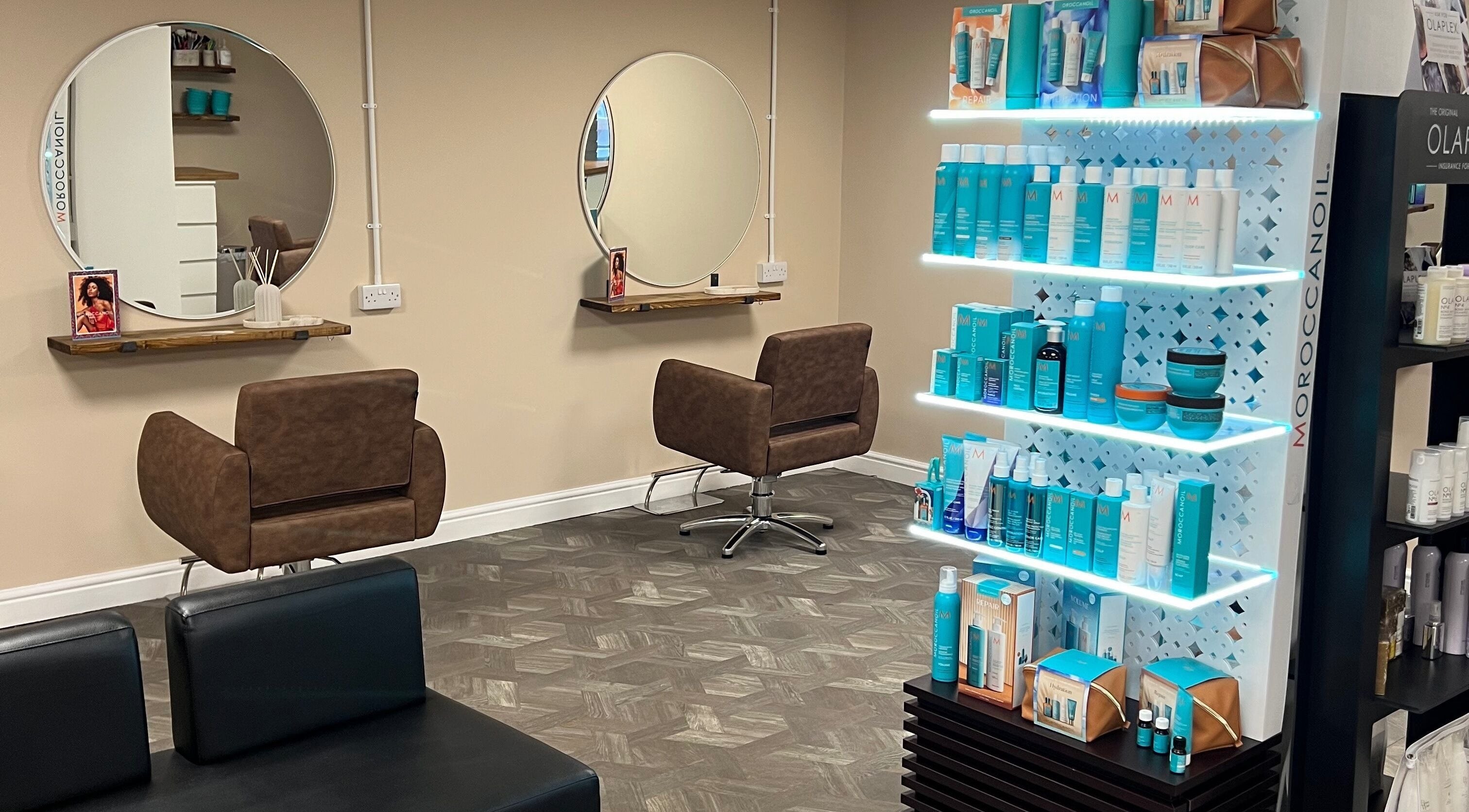 Modern styling chairs and Moroccanoil products at Halo Hair Boutique, Shepshed, England, GB.