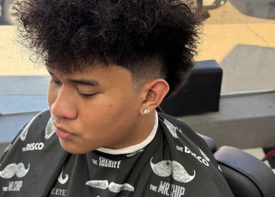 Sharp haircut by Carlos the barber at Goodfellas Barbershop, Medicine Hat, Alberta, CA.
