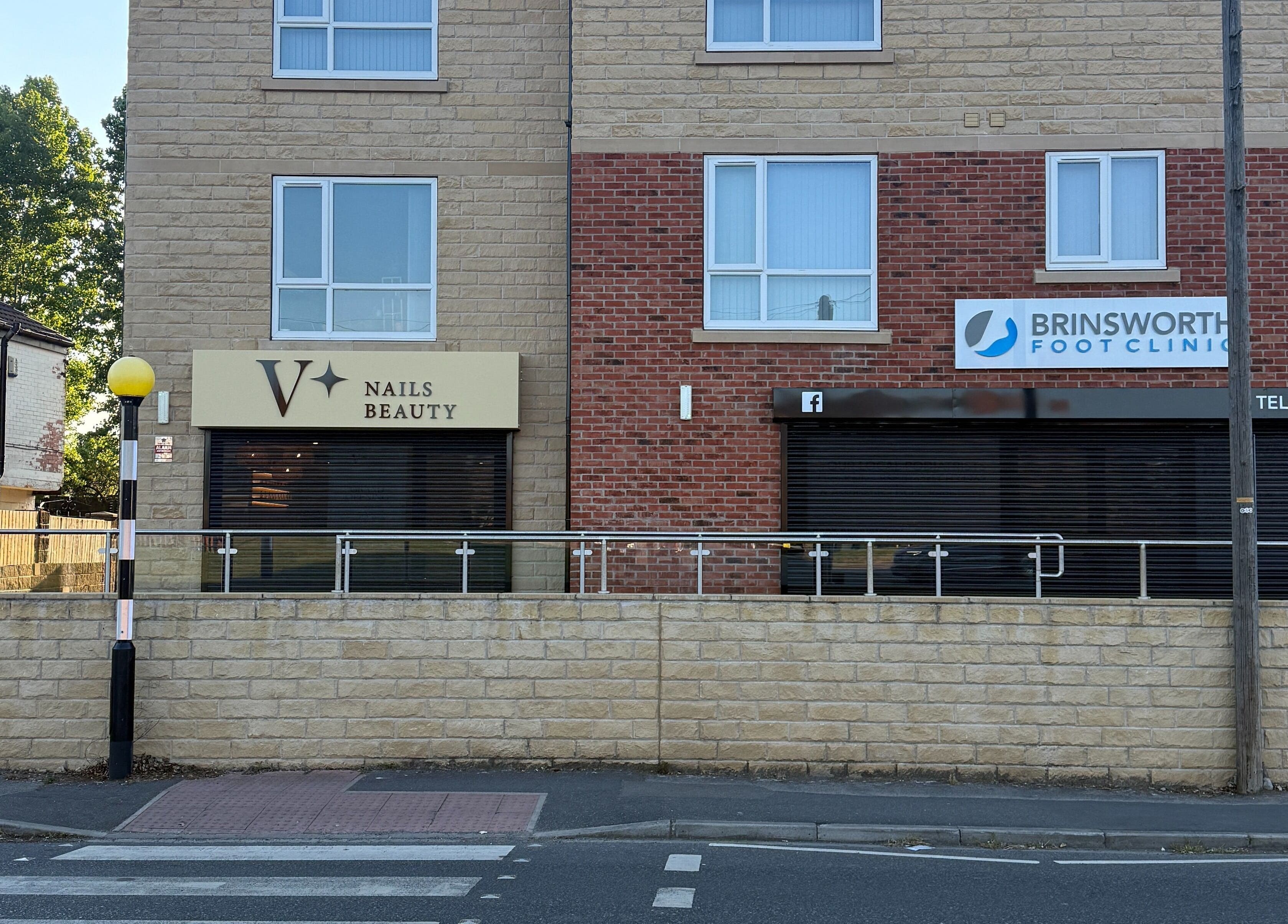 Exterior of V+ Nails Brinsworth in Brinsworth, England, GB showcasing boutique entrance.