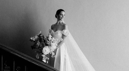 Elegant bride with bouquet at Infinity bridal hair by Maria Plackova, Limerick, County Dublin, IE.