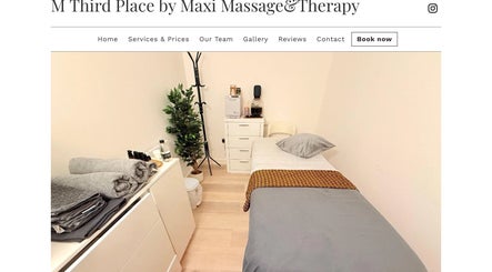 Cozy massage room at M Third Place by Maxi in London, England, GB with a bed, towels, and soothing decor.