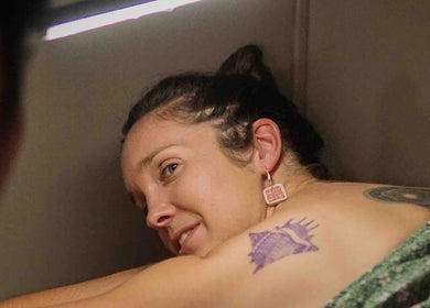 Client receiving a tattoo at ATMA TATTOO STUDIO, Mandaue, Central Visayas, PH, showcasing detailed artistry.