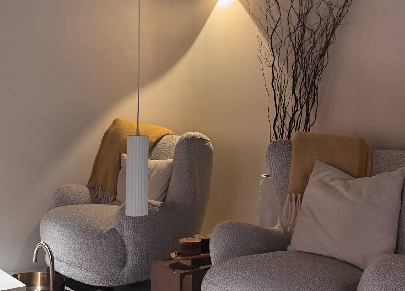 Relaxing lounge area at SolBeauty Studio Newstead, Newstead, Queensland, AU, with plush seating and ambient lighting.