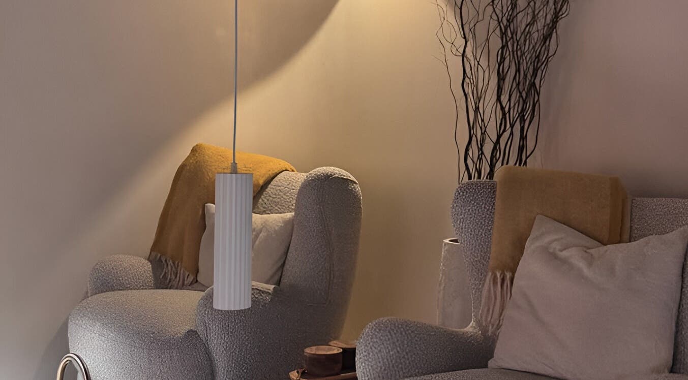 Relaxing lounge area at SolBeauty Studio Newstead, Newstead, Queensland, AU, with plush seating and ambient lighting.