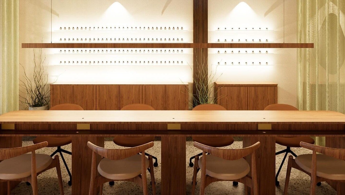 Spacious nail bar at SolBeauty Studio Newstead, Newstead, Queensland, AU with elegant wooden decor and soft lighting.