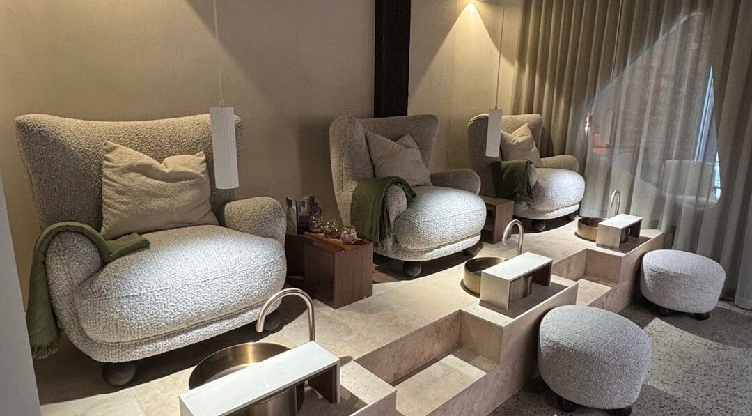 Comfortable pedicure chairs at SolBeauty Studio Newstead in Newstead, Queensland, AU with soft lighting.