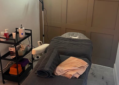 Cozy massage room with plush towels at Revive Massage, Norwich, England, GB. Perfect for relaxation and wellness.