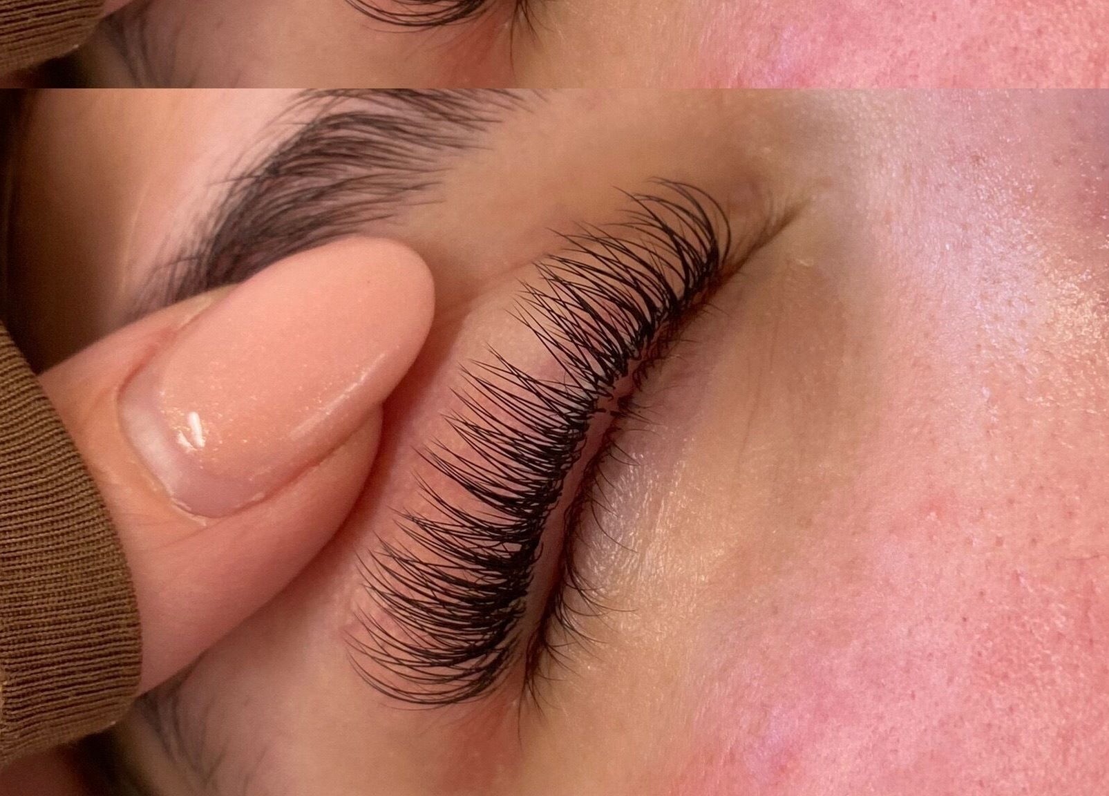 Close-up of eyelash extension service at beauty_withalix, Douglas, Douglas, IM, showcasing precision and detail.