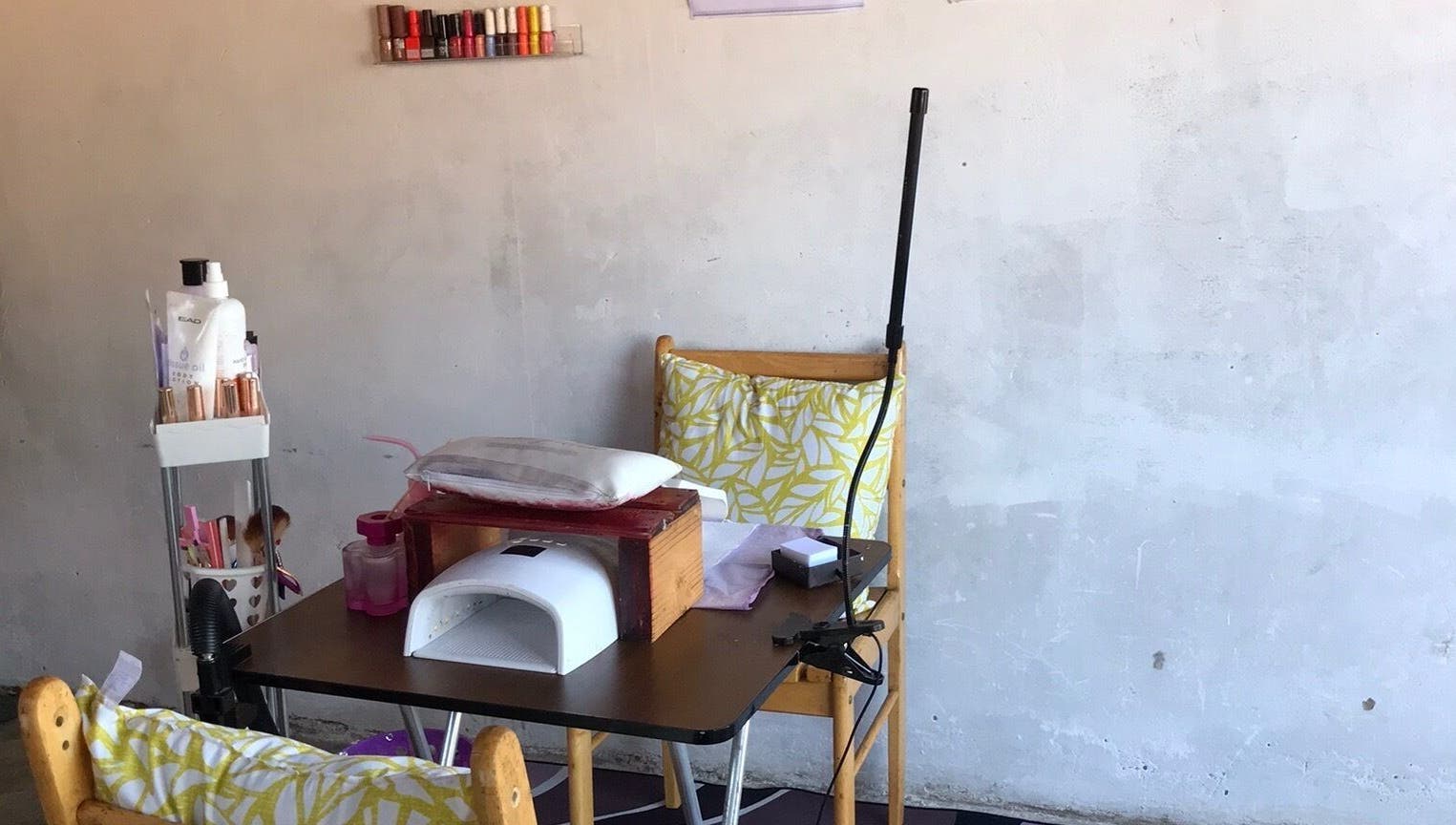 Nail setup at Quickly Polished By Petro, Parys, Free State, ZA, featuring manicure tools and colorful polishes.