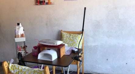 Nail setup at Quickly Polished By Petro, Parys, Free State, ZA, featuring manicure tools and colorful polishes.