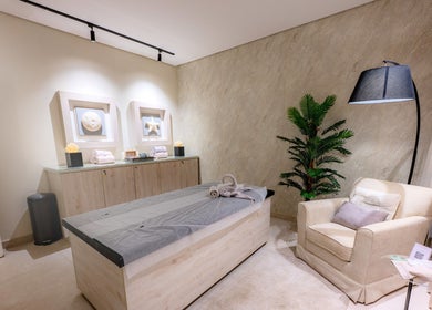 Relaxing massage room at Aroma Spa, featuring cozy ambiance in Riyadh, Riyadh Province, SA.