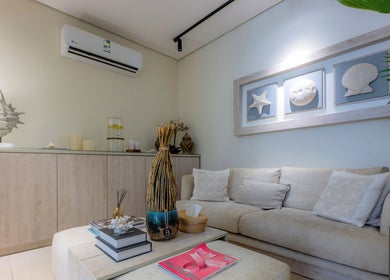 Relaxing lounge at Aroma Spa, Riyadh, Riyadh Province, SA with coastal decor and comfortable seating.