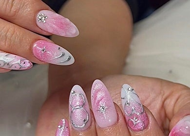 Elegant pink and silver nail art at Flamingo Nails Nelson, located in Nelson, Nelson Region, NZ.
