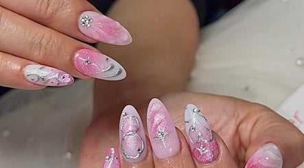 Elegant pink and silver nail art at Flamingo Nails Nelson, located in Nelson, Nelson Region, NZ.