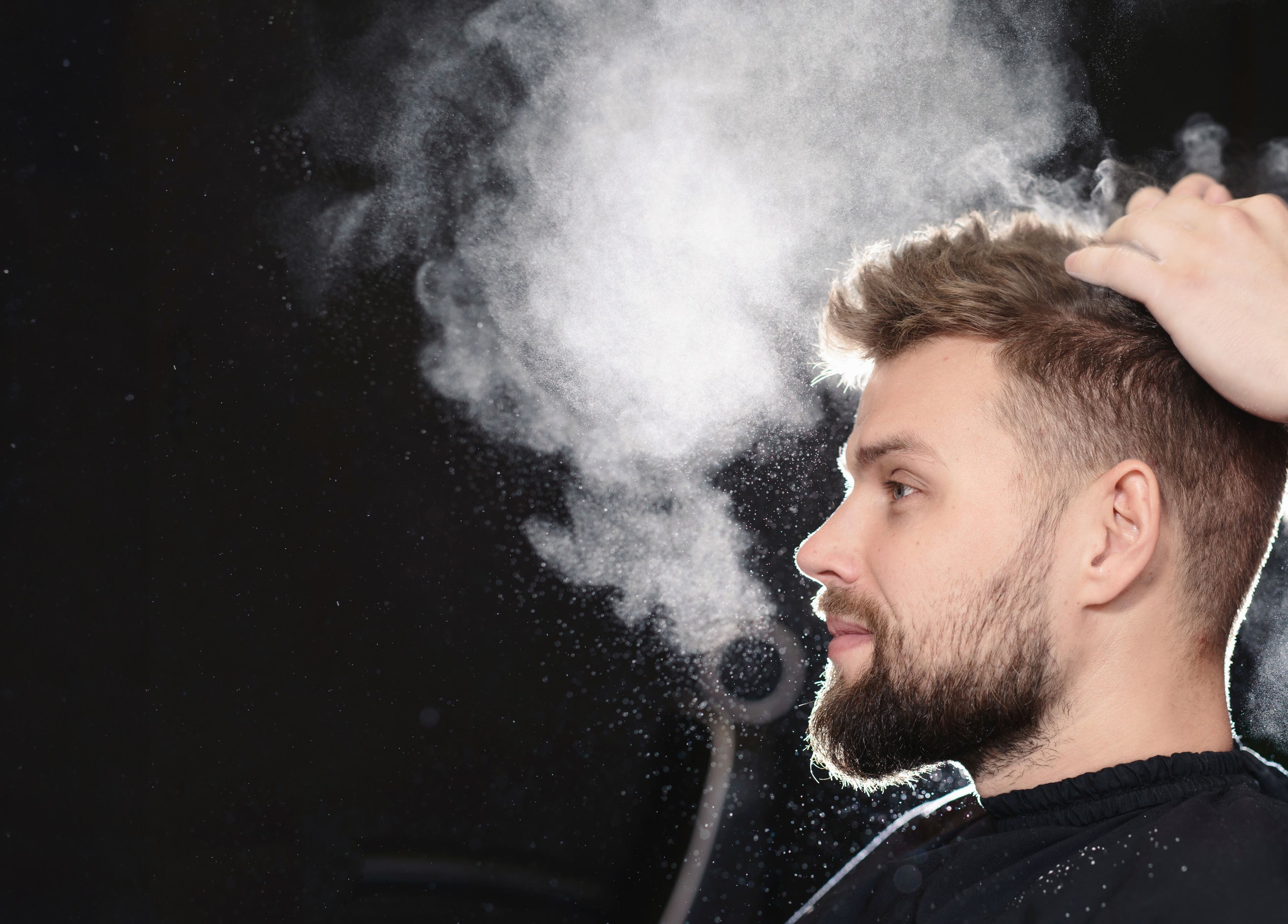 Modern haircut styling at Clean Fade Barber in Glasgow, Scotland, GB showcasing precision and technique.