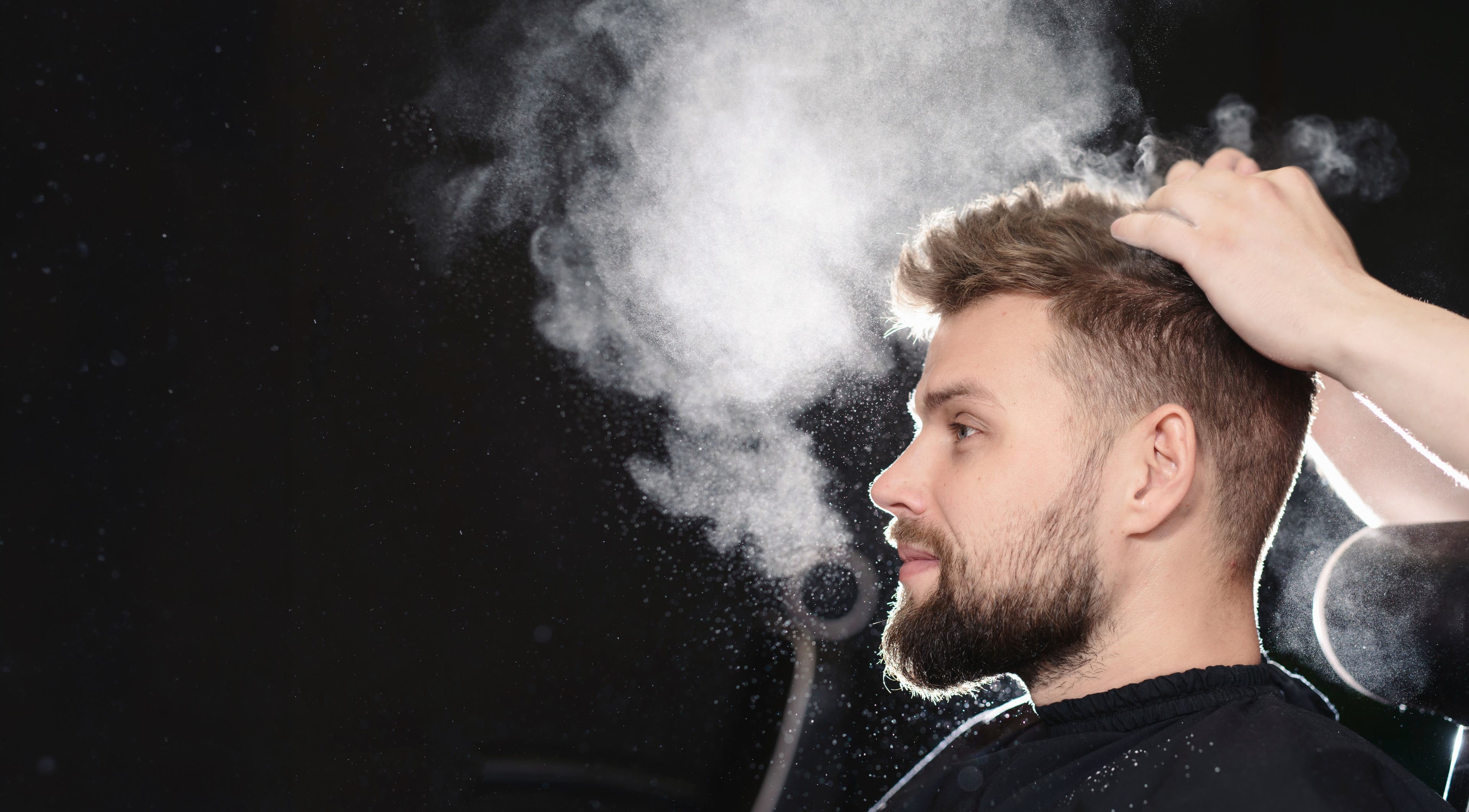 Modern haircut styling at Clean Fade Barber in Glasgow, Scotland, GB showcasing precision and technique.