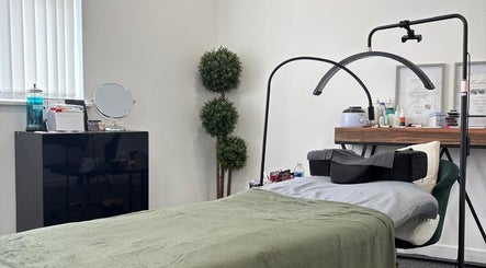Relaxing treatment room at Lancashire Lash, Adlington, England, GB, with modern decor and beauty equipment.