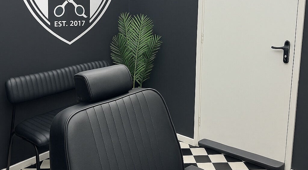 Modern black barber chair and decor at Rascal’s Barber Studio, Corby, England, GB.