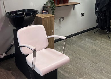 Sleek styling chair and basin at The Dollshouse Hair By Nat in Shortheath, England, GB.