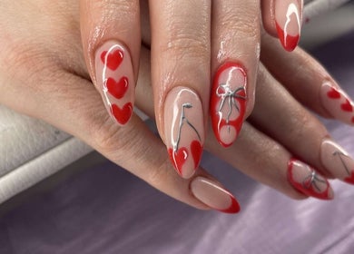 Red heart and bow nail art at The Beauty Lair (Inside Rose and Wild), London, England, GB.