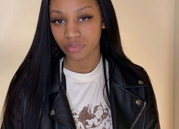 Woman with long hair at Randburg hair salon in Randburg, Gauteng, ZA showcasing stylish fashion.