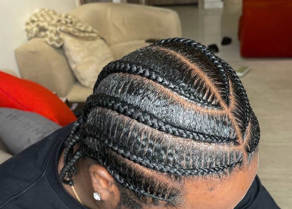 Intricate cornrows at Randburg hair salon, Randburg, Gauteng, ZA, showcasing expert styling and design.