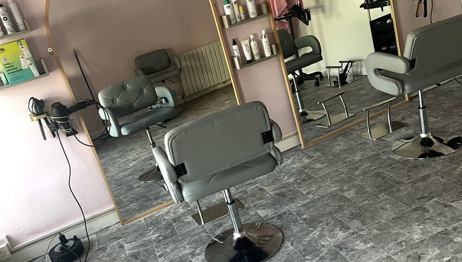 Modern styling chairs and mirrors at Lisas Hair Loft, Dumbarton, Scotland, GB.