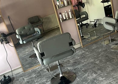 Modern styling chairs and mirrors at Lisas Hair Loft, Dumbarton, Scotland, GB.