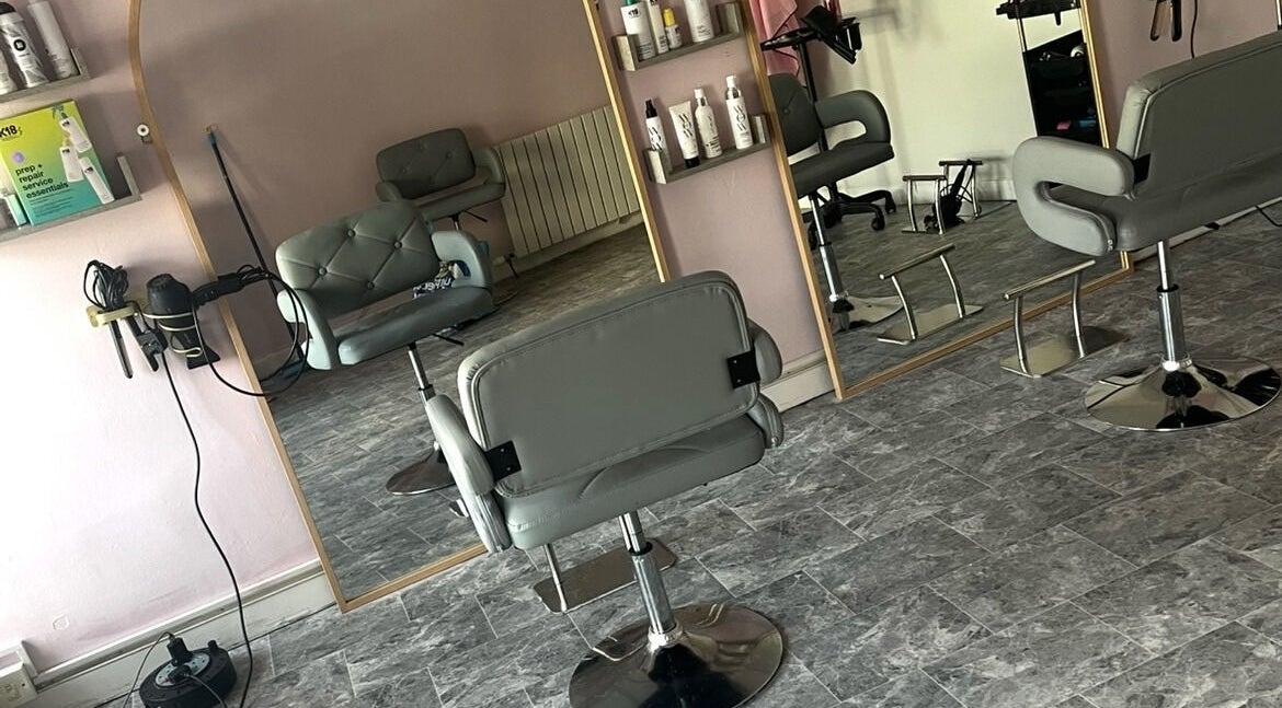 Modern styling chairs and mirrors at Lisas Hair Loft, Dumbarton, Scotland, GB.
