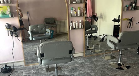 Modern salon chairs and mirrors at Lisas Hair Loft, Dumbarton, Scotland, GB.