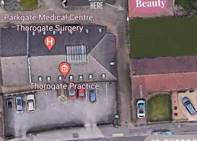 Aerial view of Serenity Beauty & Massage, Rawmarsh, England, GB, surrounded by medical centers.