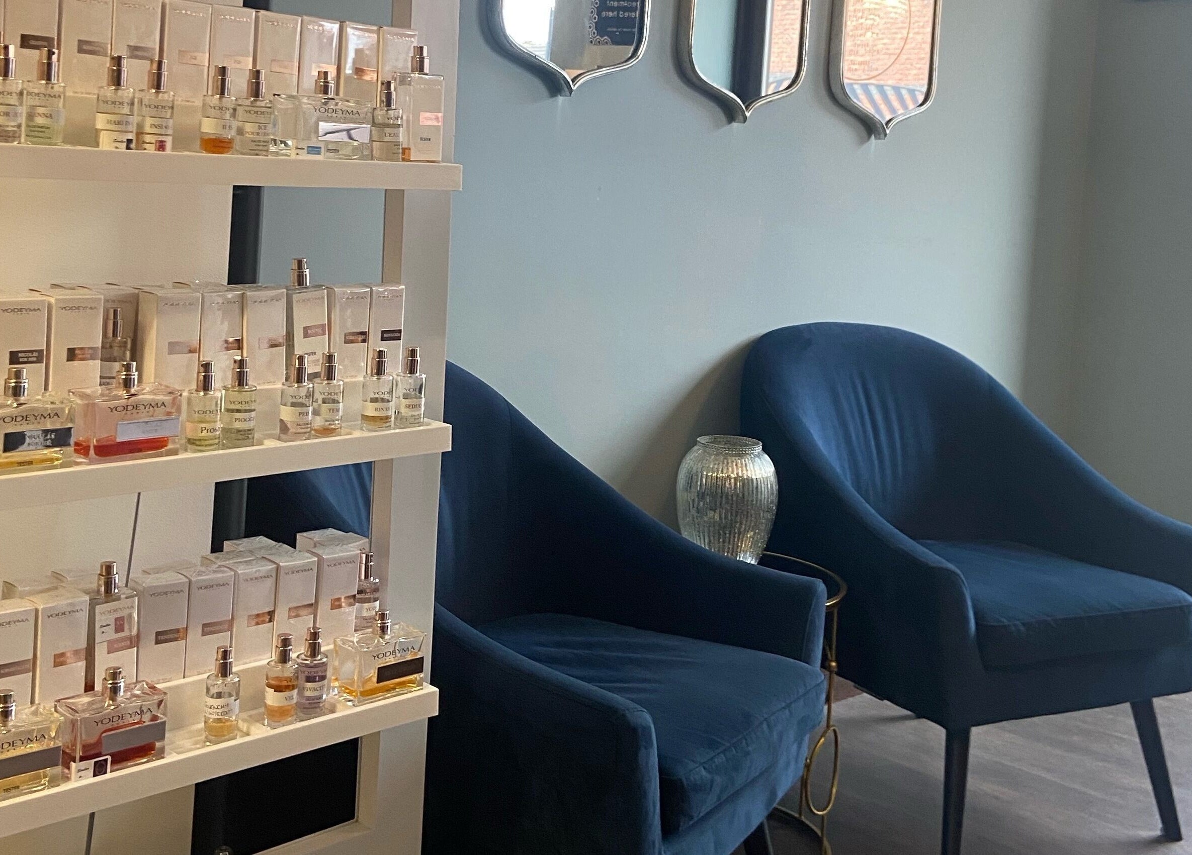 Serenity Beauty & Massage entrance in Rawmarsh, England, showcasing sitting area and fragrant products.