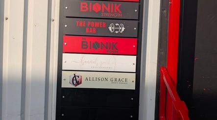 Signboard featuring Allison Grace Sports Massage at Oldham, England, GB, among other businesses.