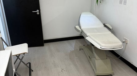 Massage table at Allison Grace Sports Massage Therapist, Skelmersdale, England, GB, calming and minimalist design.