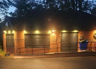 Allison Grace Sports Massage Therapist building in Skelmersdale, England, warmly lit at dusk.