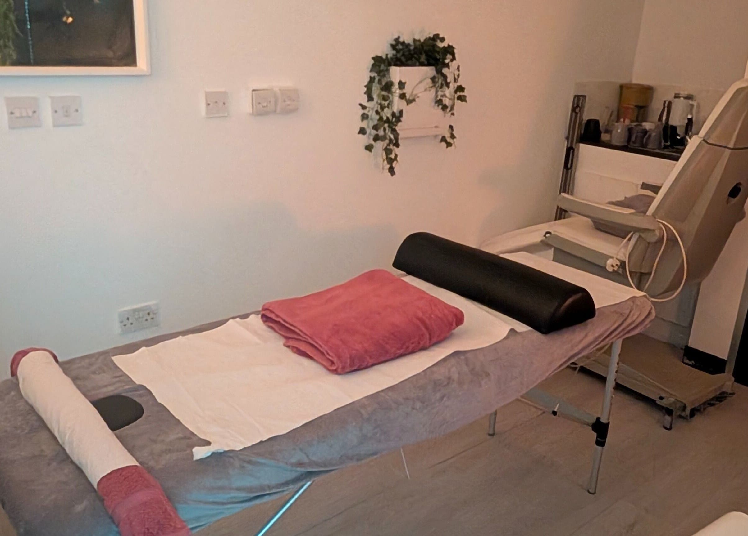 Therapy room at Allison Grace Sports Massage Therapist, Skelmersdale, England, GB, showcasing a massage table.