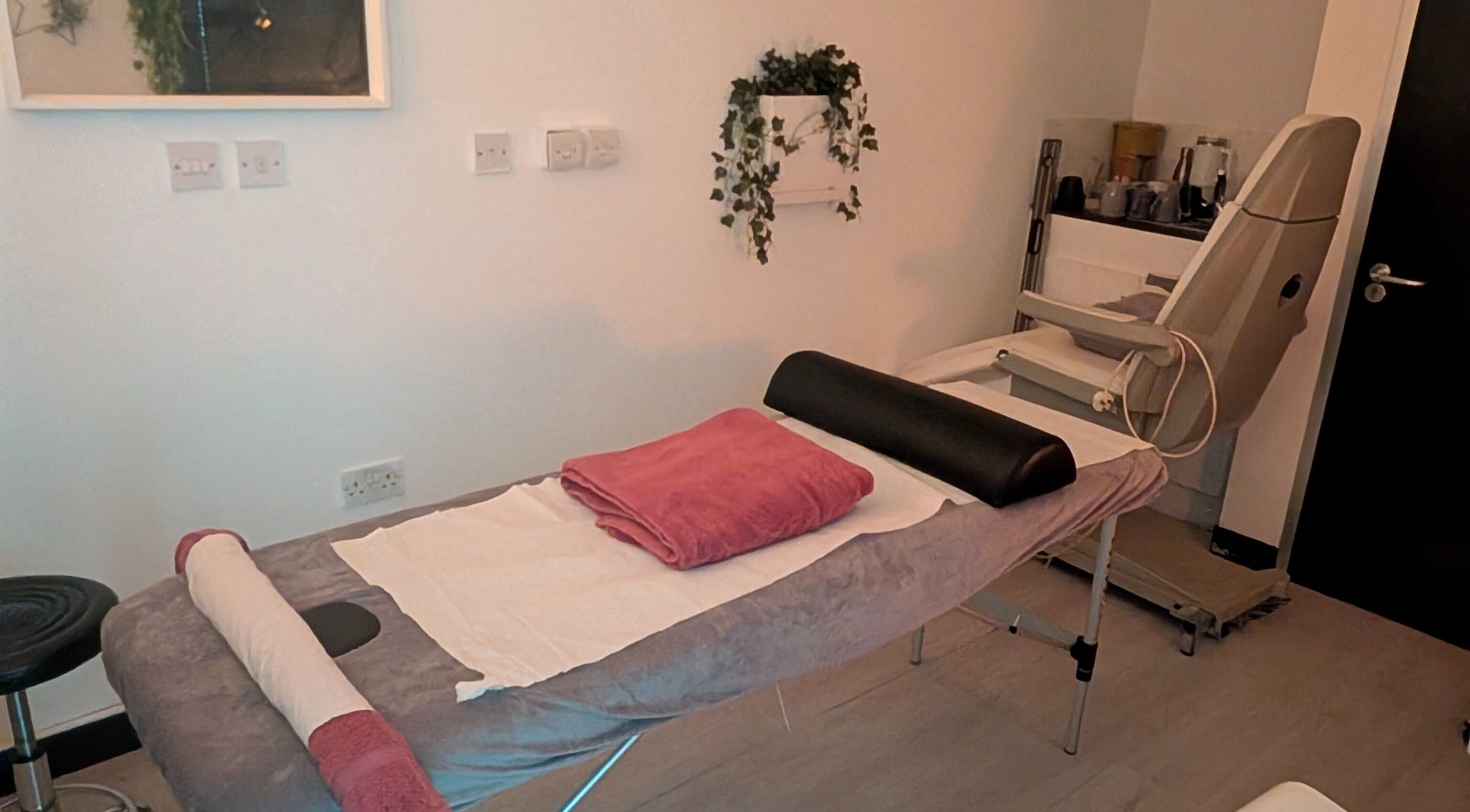 Therapy room at Allison Grace Sports Massage Therapist, Skelmersdale, England, GB, showcasing a massage table.
