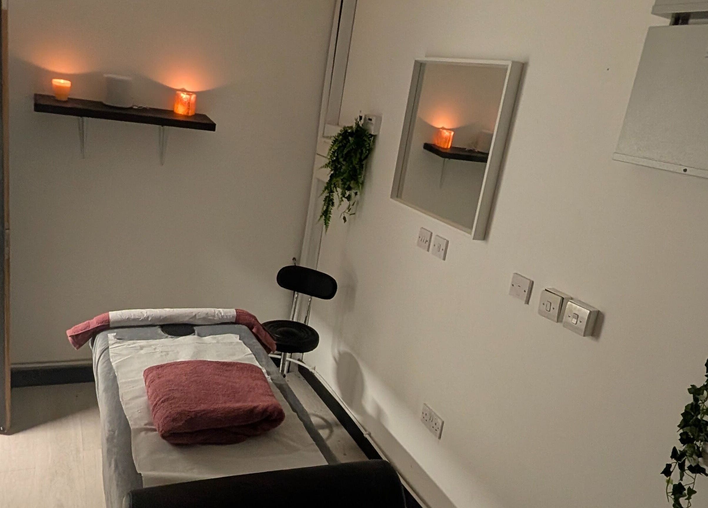Cozy therapy room at Allison Grace Sports Massage Therapist in Skelmersdale, England, GB with soft lighting and decor.