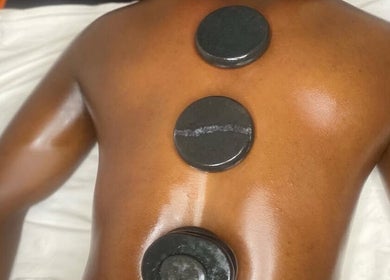 Hot stone massage at Tranquil Touch Spa, Atlanta, Georgia, US offers relaxation and rejuvenation.