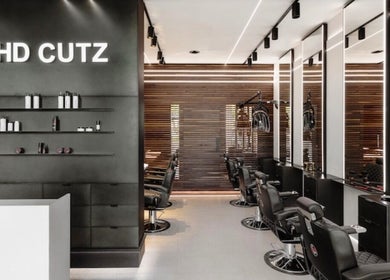 Modern interior of MarkconHDCUTZ in London, England, GB with sleek barber chairs and stylish decor.