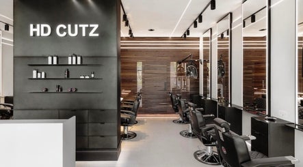 Modern interior of MarkconHDCUTZ in London, England, GB with sleek barber chairs and stylish decor.