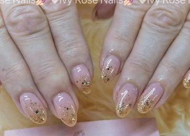 Elegant golden glitter nails at Ivy Rose Nails Ormeau, Ormeau, Queensland, AU, showcasing expert nail artistry.