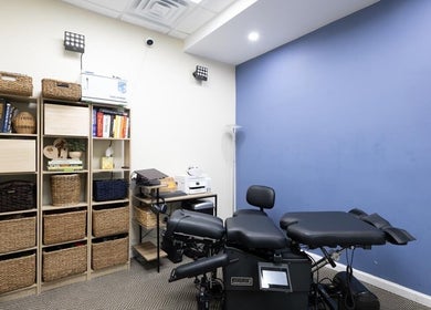 Modern therapy room at Fixinhumans Manhattan with blue walls in New York, New York, US.