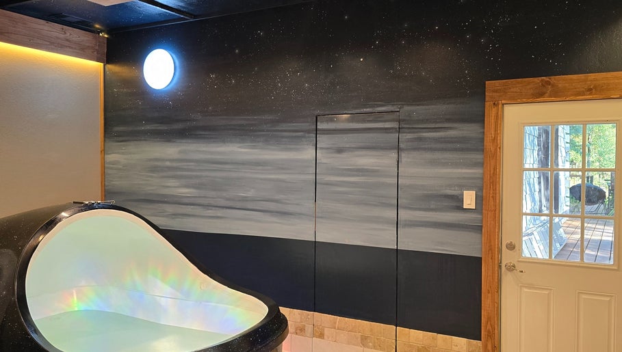Float pod with starlit walls at Dharma River ZenFloat Spa, Daphne, Alabama, US.