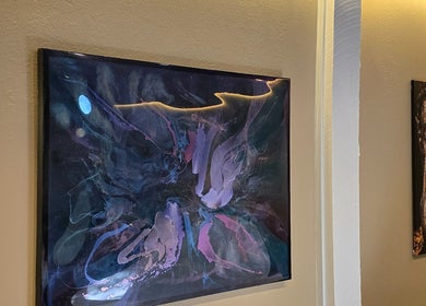Vibrant abstract art at Dharma River ZenFloat Spa in Daphne, Alabama, US creates a serene ambiance.