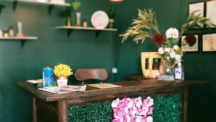 Reception area of Blue Pacific Organic Salon in Suva, Central Division, FJ, featuring floral decorations.