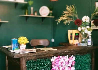 Reception area of Blue Pacific Organic Salon in Suva, Central Division, FJ, featuring floral decorations.